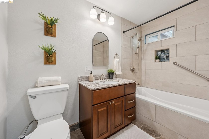 Thoughtfully updated throughout, this single-level home offers a - photo 22