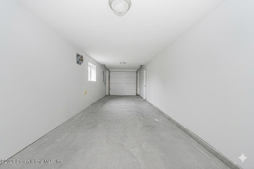 Brand-new 6 over 6 two-family home located in the desirable - photo 44