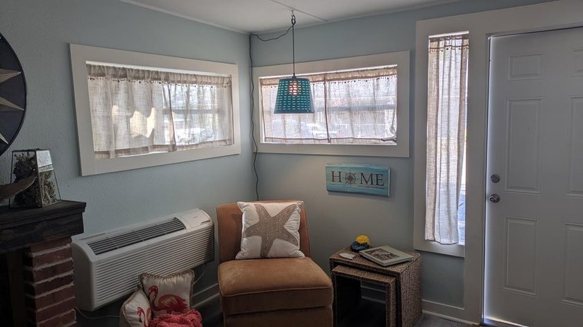 Escape to this beautifully renovated coastal getaway, offered - photo 8