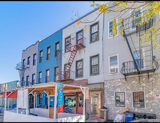 Fantastic opportunity to own a beautifully renovated mixed-use - photo 2