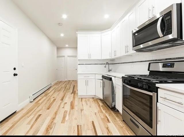 Fantastic opportunity to own a beautifully renovated mixed-use - photo 8