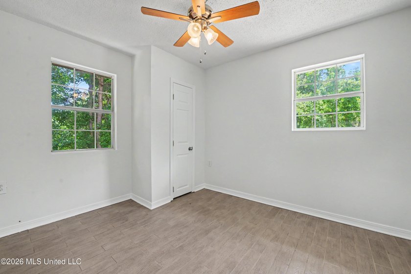 This cozy retreat home is in Bayou La Croix Estates, Bay St - photo 11