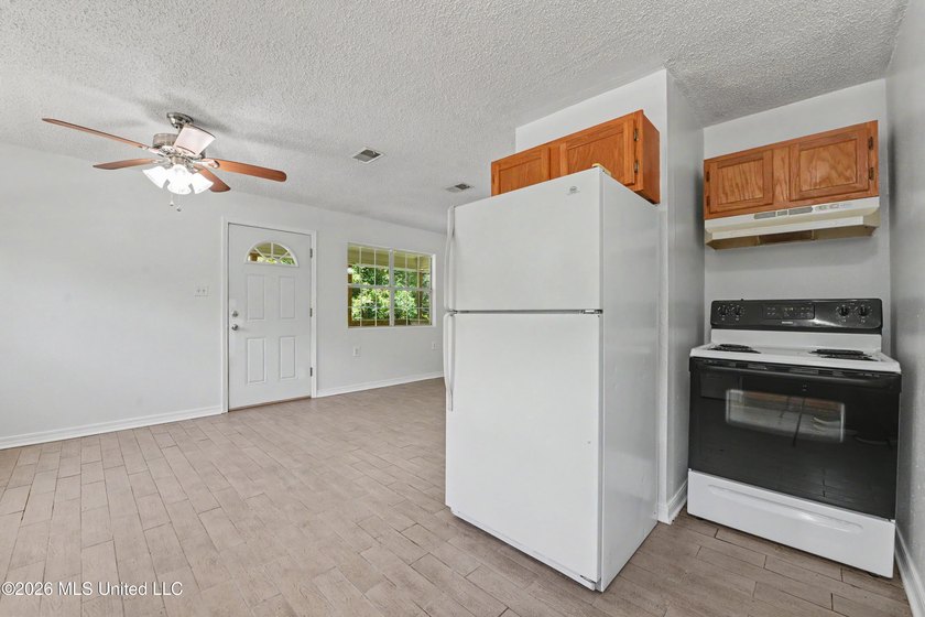 This cozy retreat home is in Bayou La Croix Estates, Bay St - photo 13