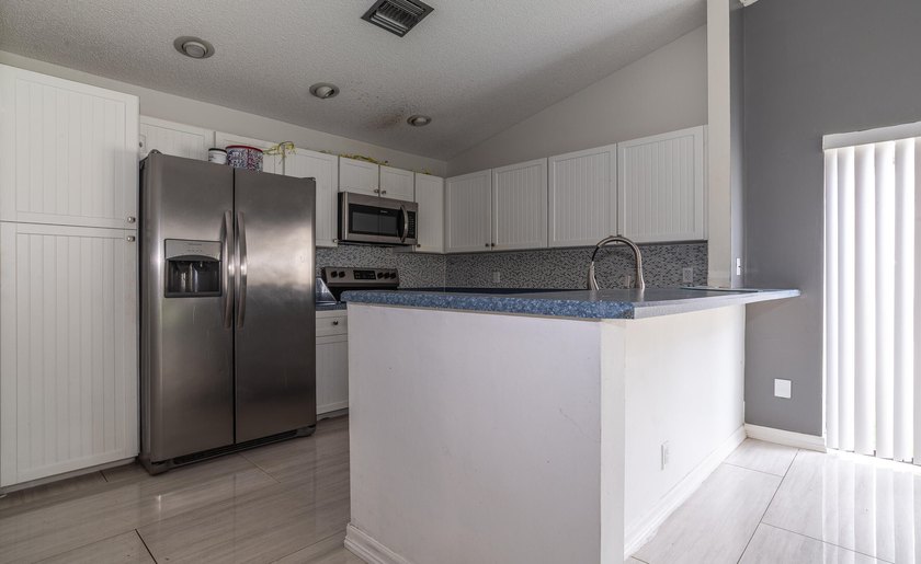 This 3-bedroom, 2-bathroom single-story home offers 1,672 square - photo 24