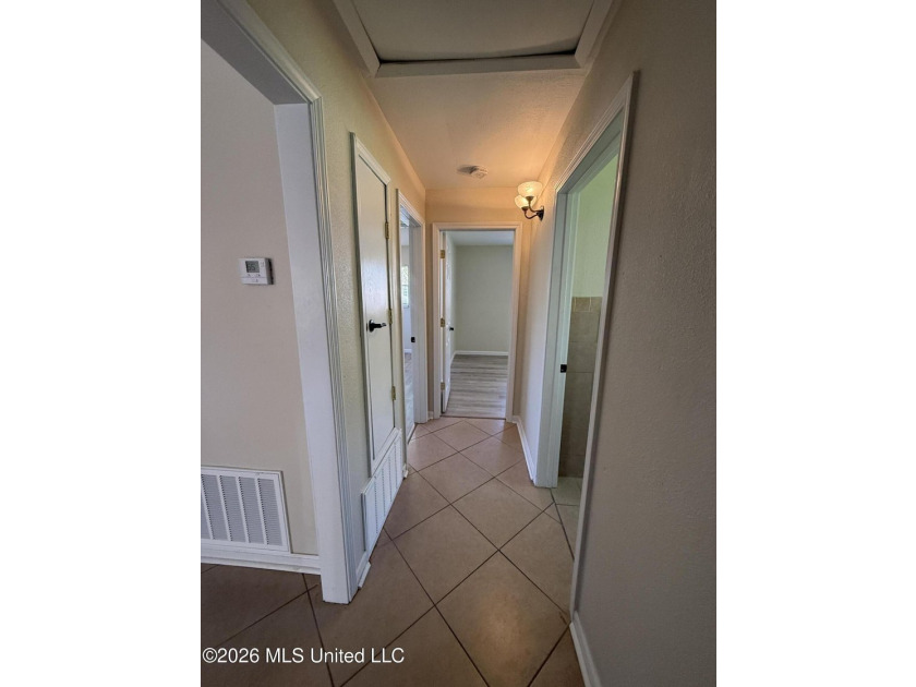 Beautifully remodeled brick ranch just a short walk to the beach - photo 15