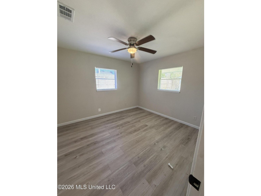 Beautifully remodeled brick ranch just a short walk to the beach - photo 16