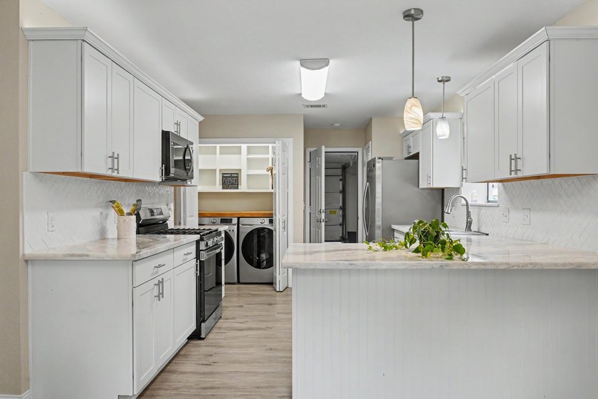 Welcome home to this gorgeous, light-filled 3-bedroom - photo 12