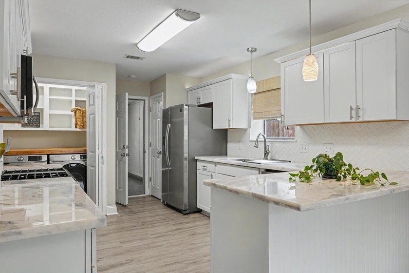 Welcome home to this gorgeous, light-filled 3-bedroom - photo 13