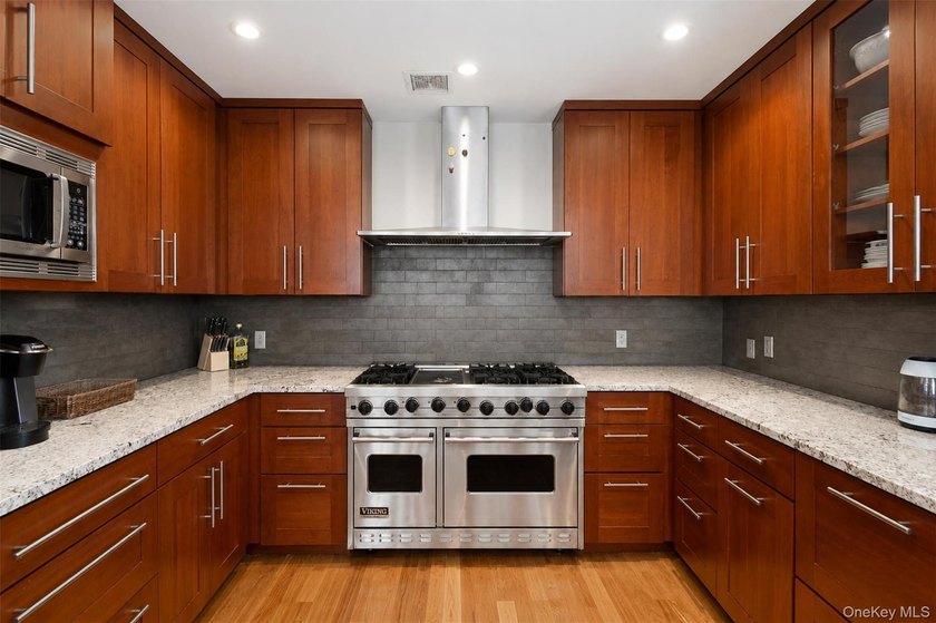 Welcome to Residence 9A at 3220 Arlington Avenue, an exceptional - photo 3