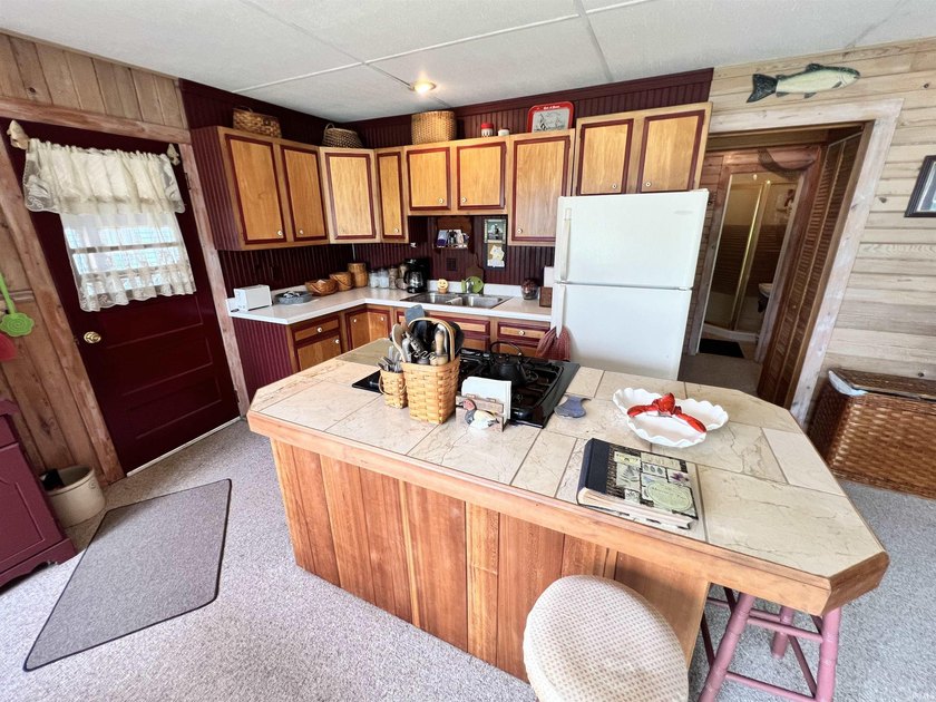 Welcome to lakefront living on beautiful Sechrist Lake! This - photo 4