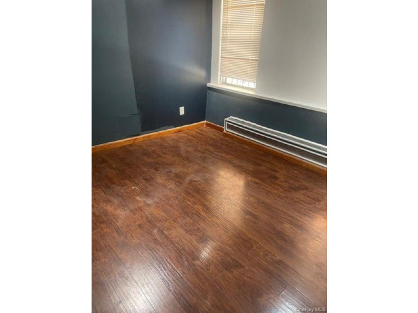 This exceptional property features three spacious units - photo 4