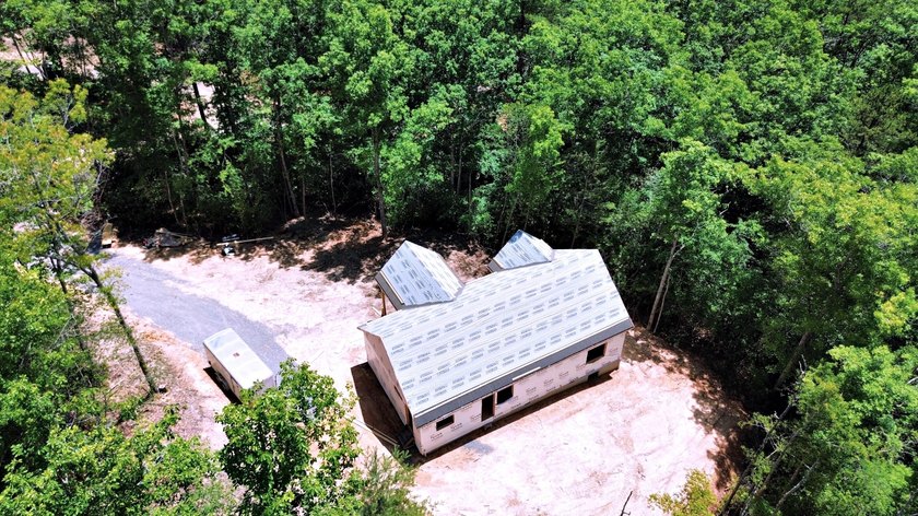 Be the first to own The Osprey, this brand-new 3-bedroom, 2-bath - photo 3