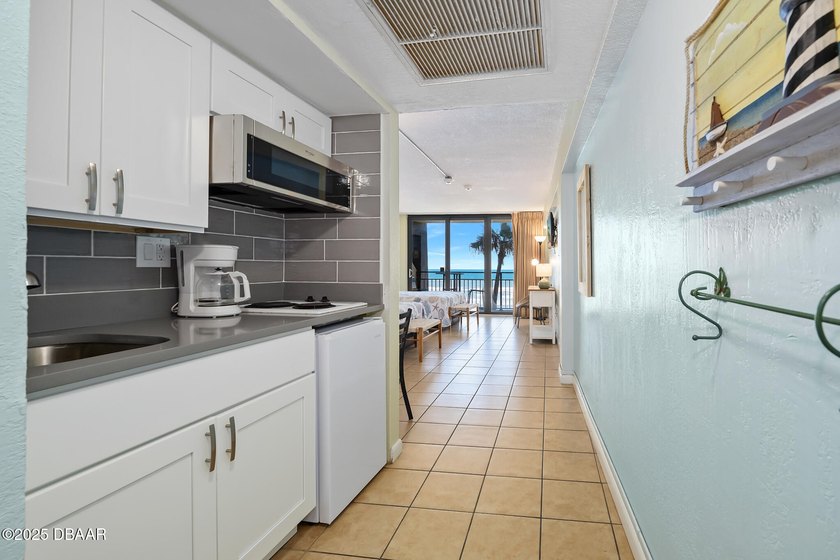 Prime Oceanfront Investment or Vacation Escape Don't miss this - photo 3