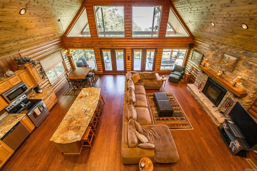Come checkout this Furnished Lakefront Log cabin with stunning - photo 10