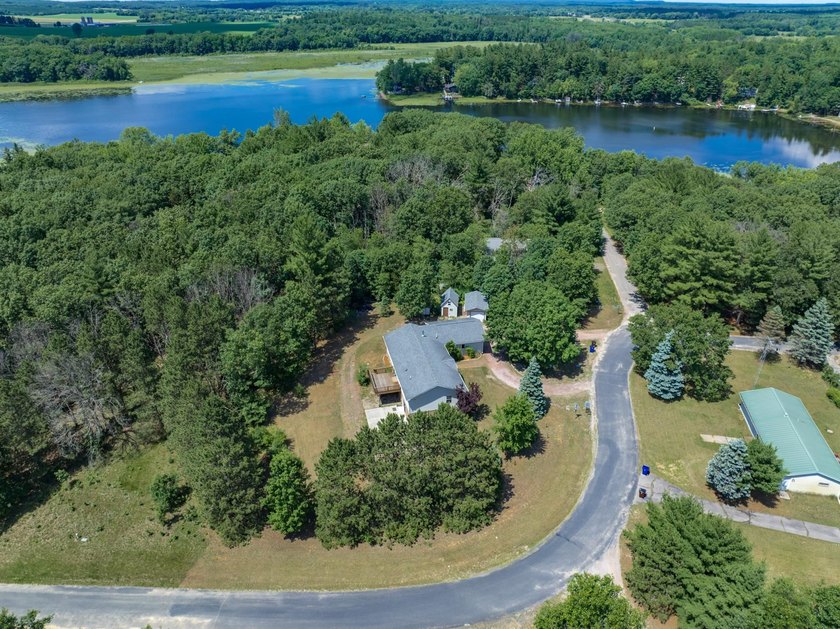 Built in 2014 and situated on a secluded 0.94-acre lot, this - photo 2
