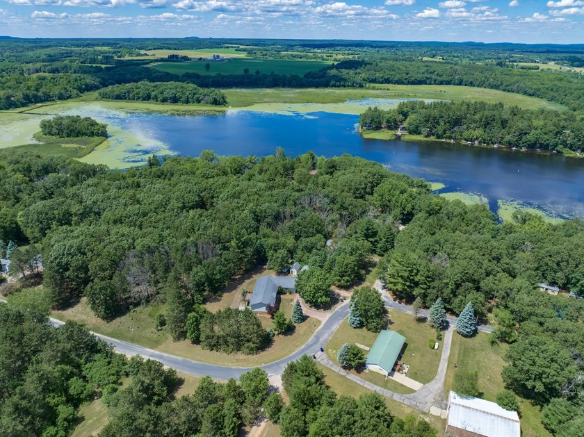 Built in 2014 and situated on a secluded 0.94-acre lot, this - photo 3