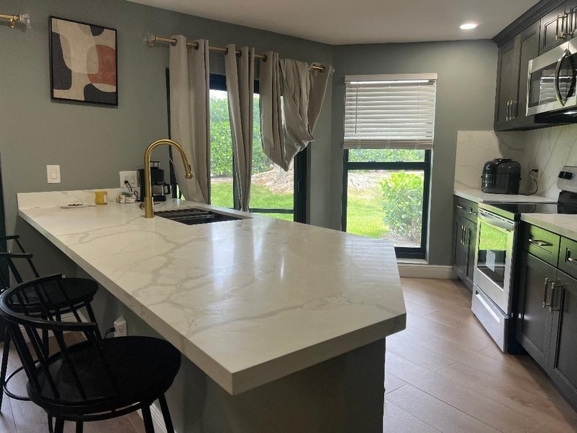 EVERYTHING IS UPDATED!...Classy Community!... Classy unit! - photo 5