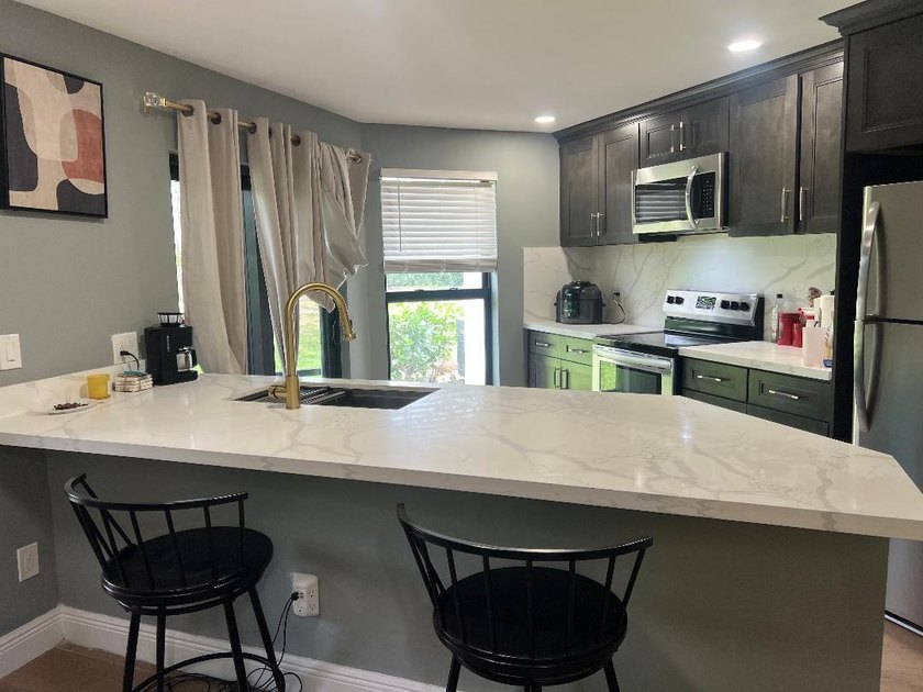 EVERYTHING IS UPDATED!...Classy Community!... Classy unit! - photo 7
