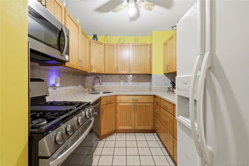 Welcome to this charming semi-attached two-family home offering - photo 8