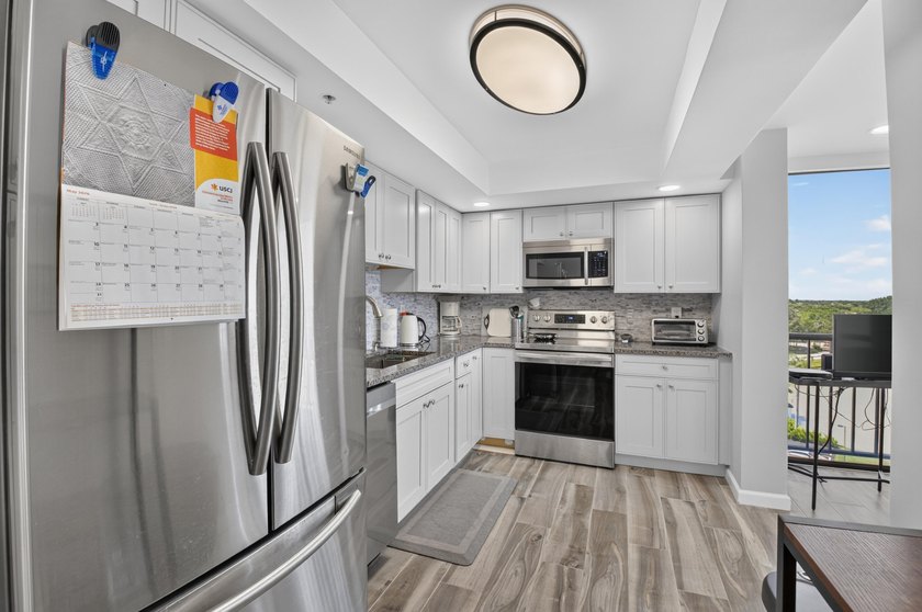 Lakewood 7th floor corner Midrise apartment with great panoramic - photo 14