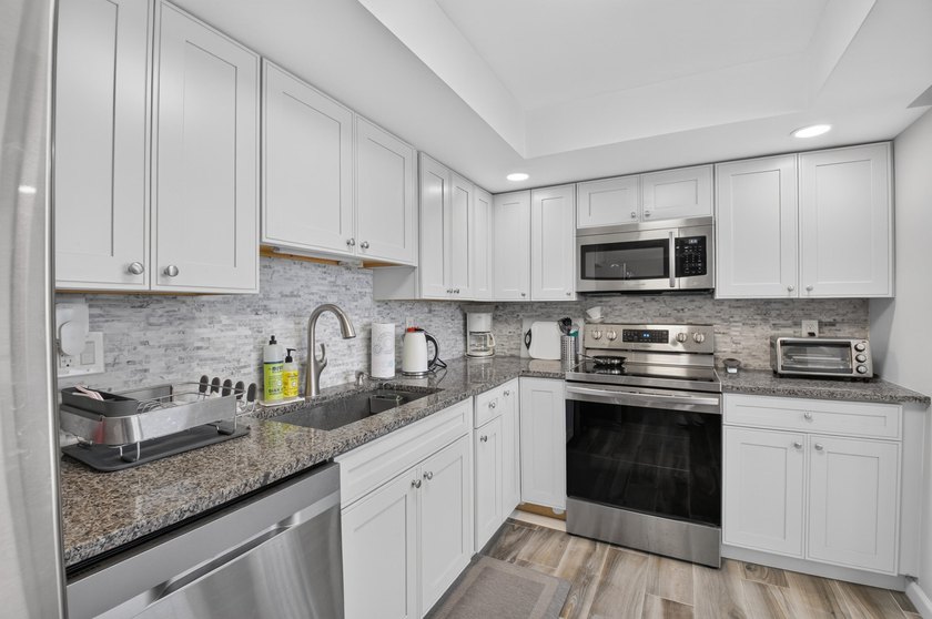 Lakewood 7th floor corner Midrise apartment with great panoramic - photo 16