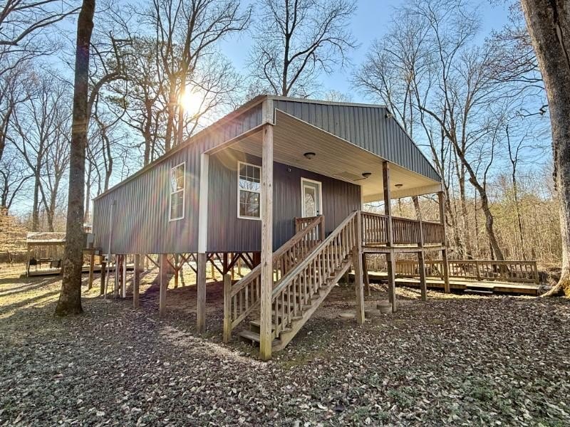 Sitting on a peaceful 24.37 just 1 mile off I22, this 2br/1ba - photo 2
