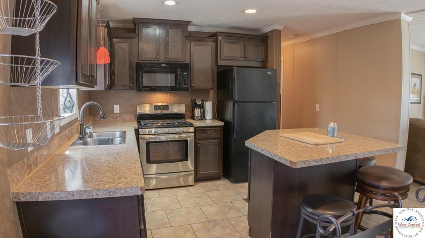 This charming 1,350 sq ft manufactured home sits on a permanent - photo 12
