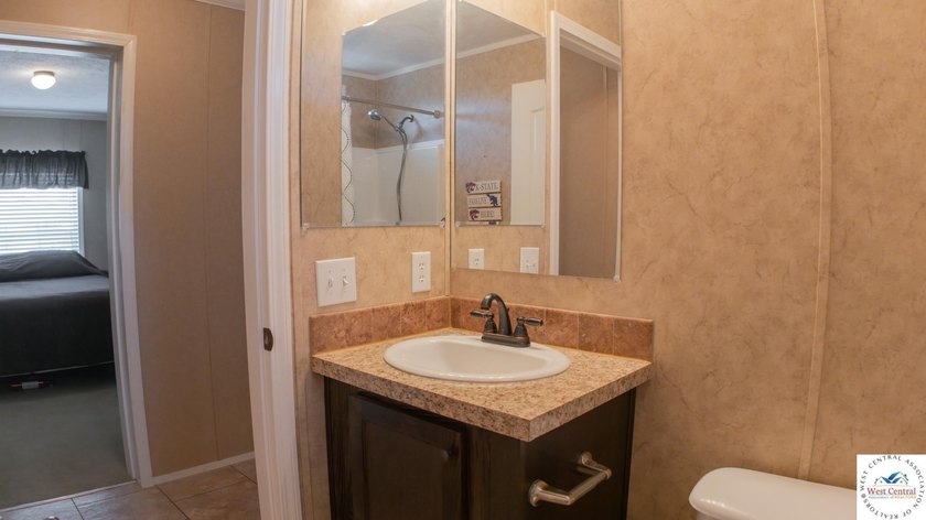 This charming 1,350 sq ft manufactured home sits on a permanent - photo 28