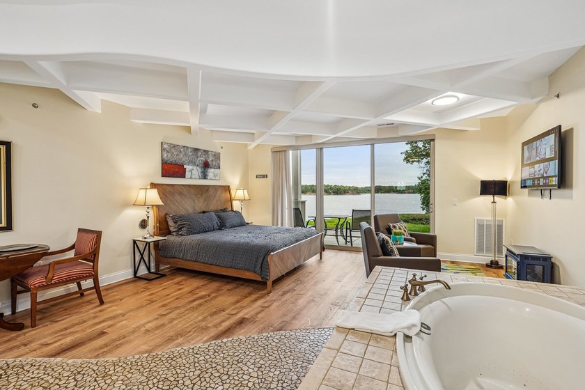 Experience luxury lakeside living on Lake Delton in this - photo 10