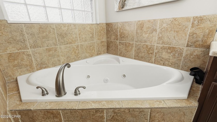 This spacious 6-bedroom, 4-bath home offers 4,230 square feet of - photo 39