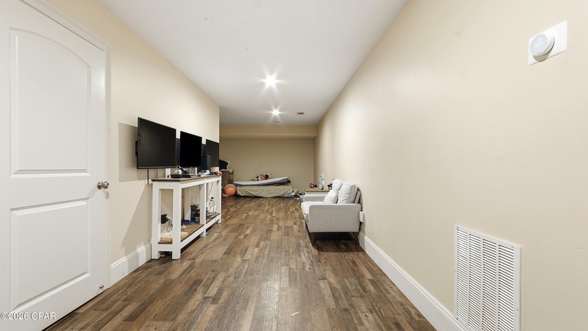 This spacious 6-bedroom, 4-bath home offers 4,230 square feet of - photo 43