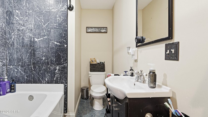 This spacious 6-bedroom, 4-bath home offers 4,230 square feet of - photo 46