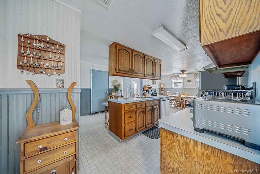 Welcome to this beautifully maintained expanded ranch in - photo 12