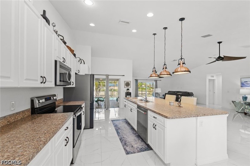 Enjoy living the southwest Florida lifestyle in this immaculate - photo 3