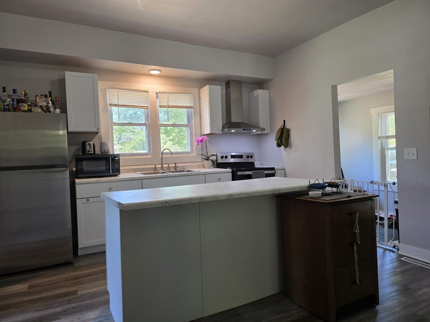 This efficient 2-bedroom, 1-bathroom single-story home offers a - photo 2