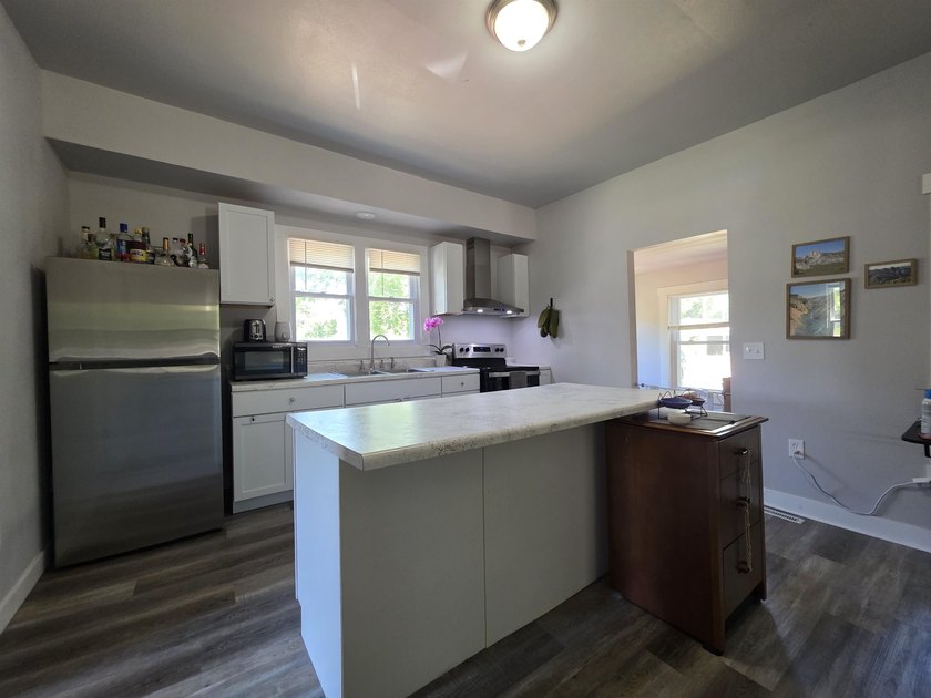 This efficient 2-bedroom, 1-bathroom single-story home offers a - photo 8