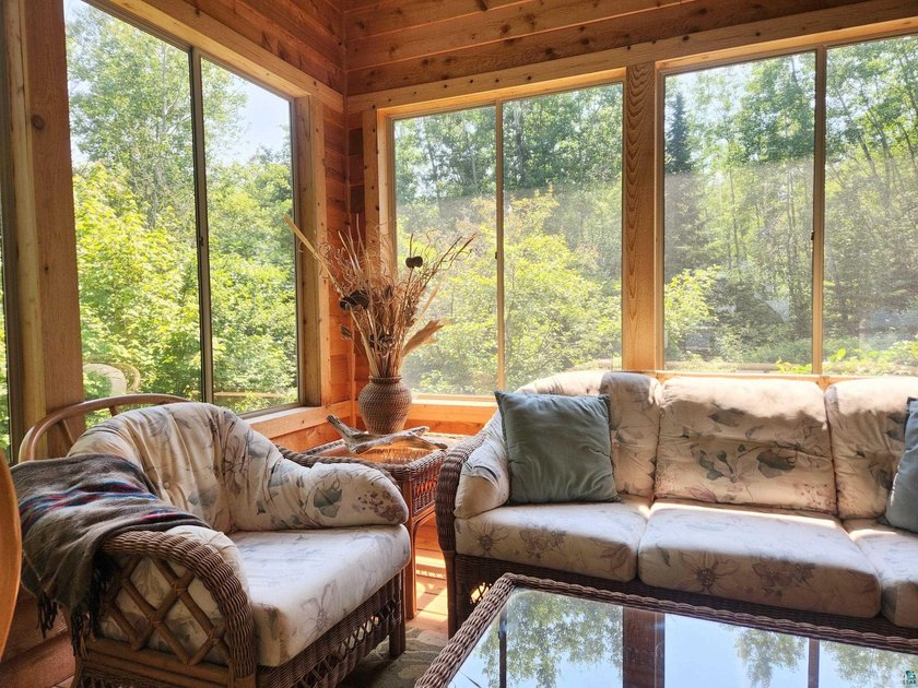 Set on approximately 220 feet of sandy Lake Superior shoreline - photo 8