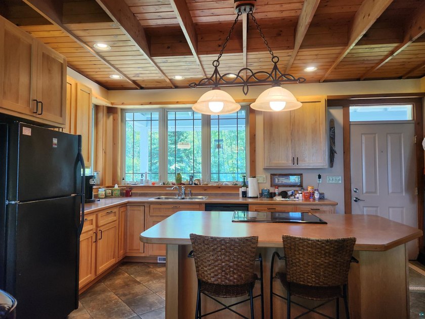 Set on approximately 220 feet of sandy Lake Superior shoreline - photo 10