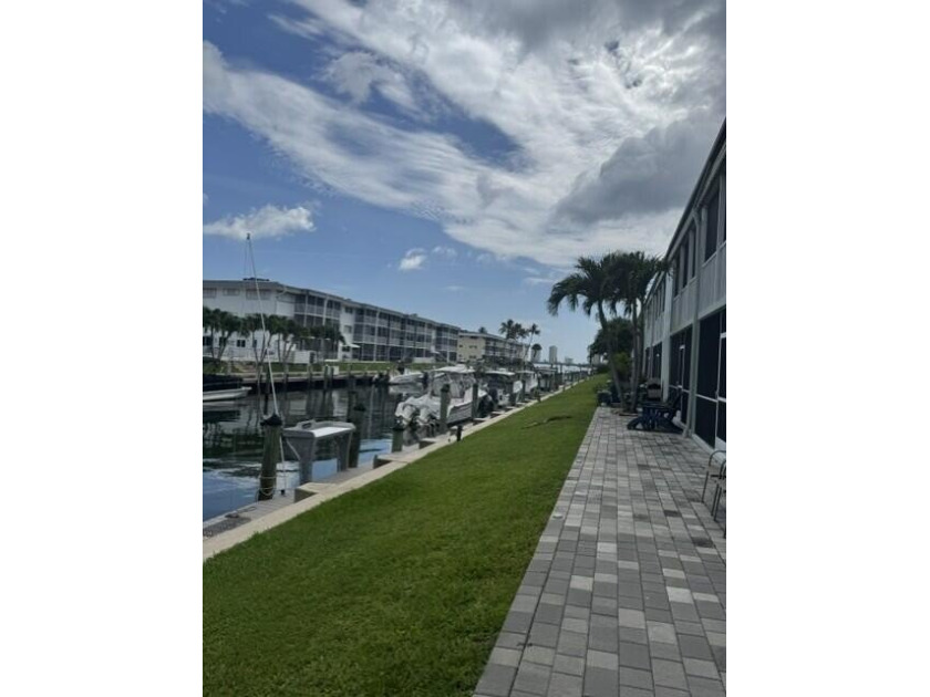 Welcome to this charming two-bedroom, two-bathroom condominium - photo 11