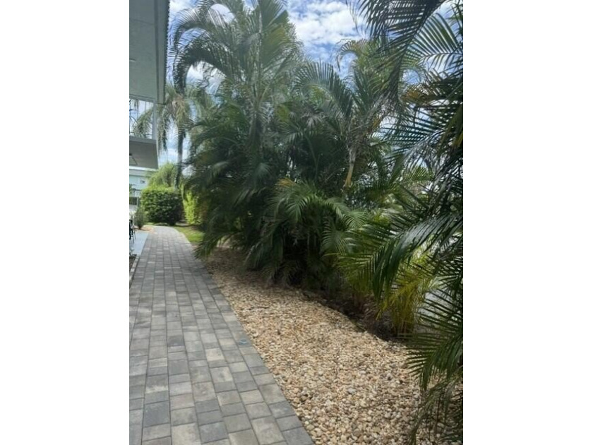 Welcome to this charming two-bedroom, two-bathroom condominium - photo 12