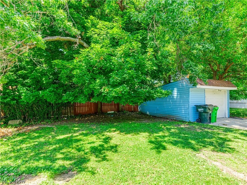 This 3-bedroom, 2-bath bungalow offers a bright, open feel with - photo 4