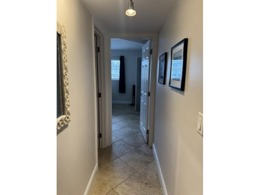 Welcome to this charming two-bedroom, two-bathroom condominium - photo 14