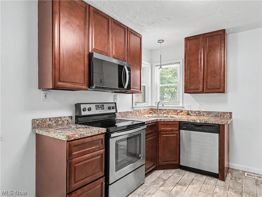 This 3-bedroom, 2-bath bungalow offers a bright, open feel with - photo 9