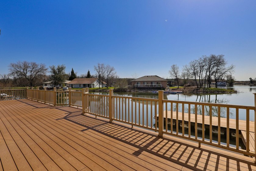 Impressive home with private dock located inside the gated - photo 5