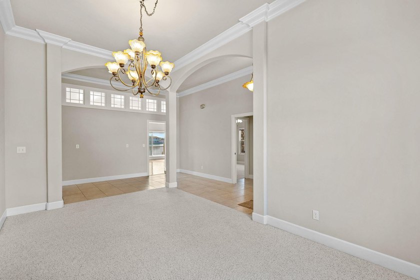 Impressive home with private dock located inside the gated - photo 9