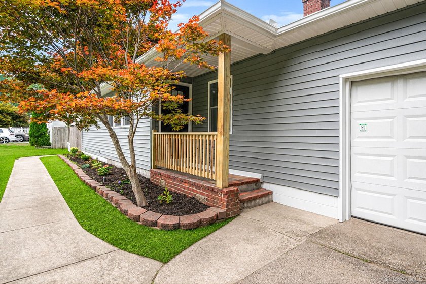 Welcome to 11 Mayfield Dr, Mastic Beach! This beautifully - photo 3