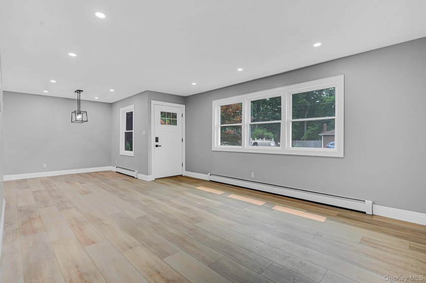 Welcome to 11 Mayfield Dr, Mastic Beach! This beautifully - photo 5