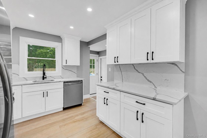 Welcome to 11 Mayfield Dr, Mastic Beach! This beautifully - photo 7