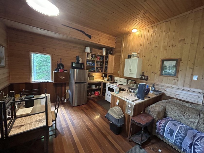 Escape to the serenity of the mountains with this charming cabin - photo 10