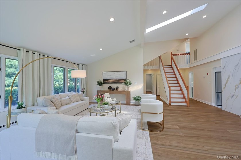 Nestled in the heart of the prestigious Strathmore Village of - photo 2